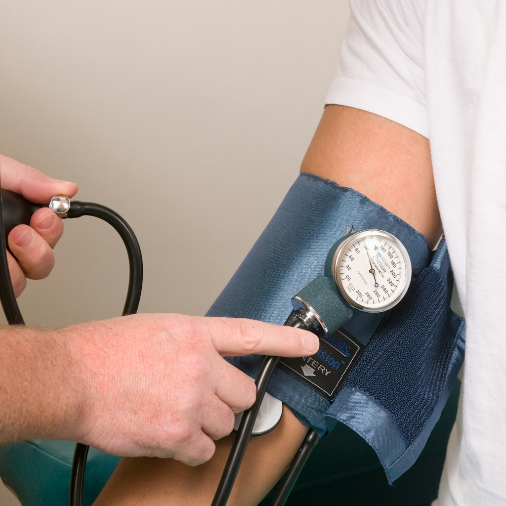 Doctor measuring blood pressure